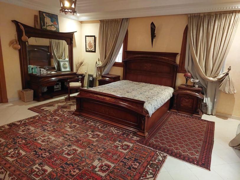 Exceptional Villa with Pool, Landscaped Garden, and Security for Sale in Marrakech-9